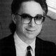A photograph of CCC president Noel C. Bloom shows a middle-aged man in glasses.
